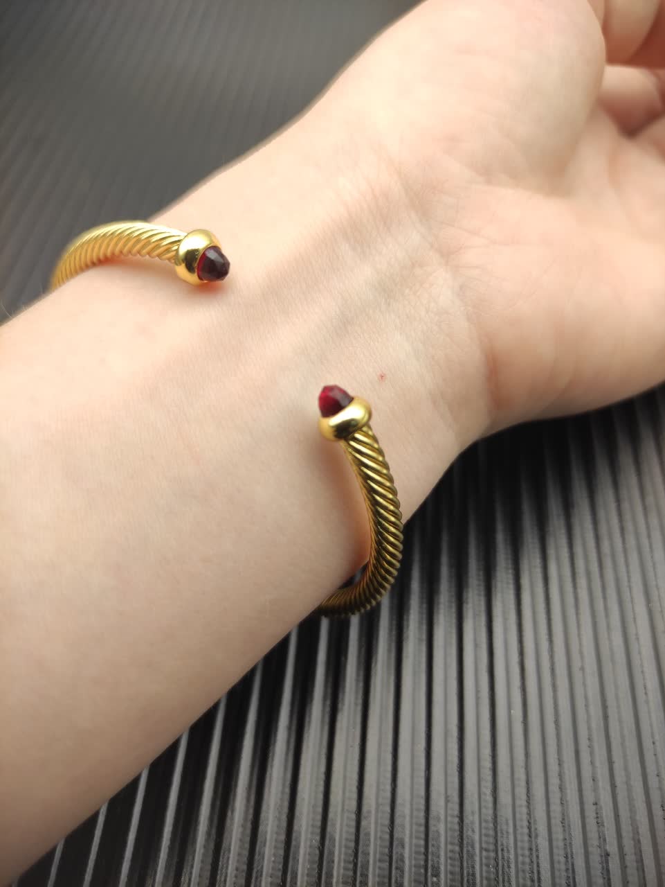 David Yurman Gold Tone Wire Bangle Bracelet with Red Gemstone David Yurman Gold Tone Wire Bangle Bracelet with Red Gemstone